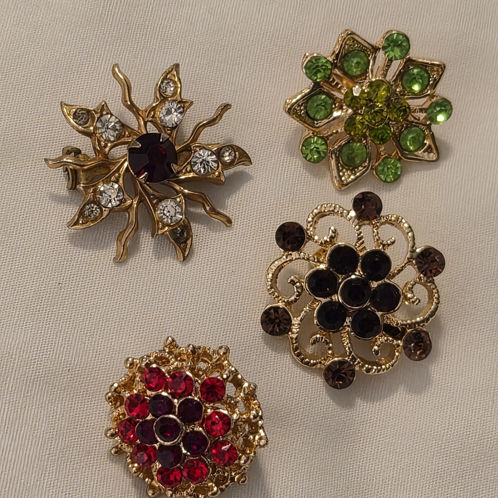 Elegant Gold and Multicolor Brooch Set